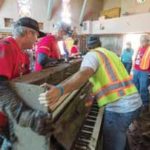 Bucket Brigade moving piano